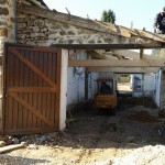 Dépose des pavés et de la couverture garage et mise en place de la nouvelle charpente